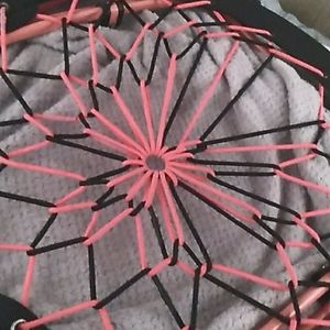 A pink springy chair